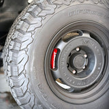 A red TTSPORT 7640TK 6-piston big brake kit is installed on the GWM Cannon front wheel.