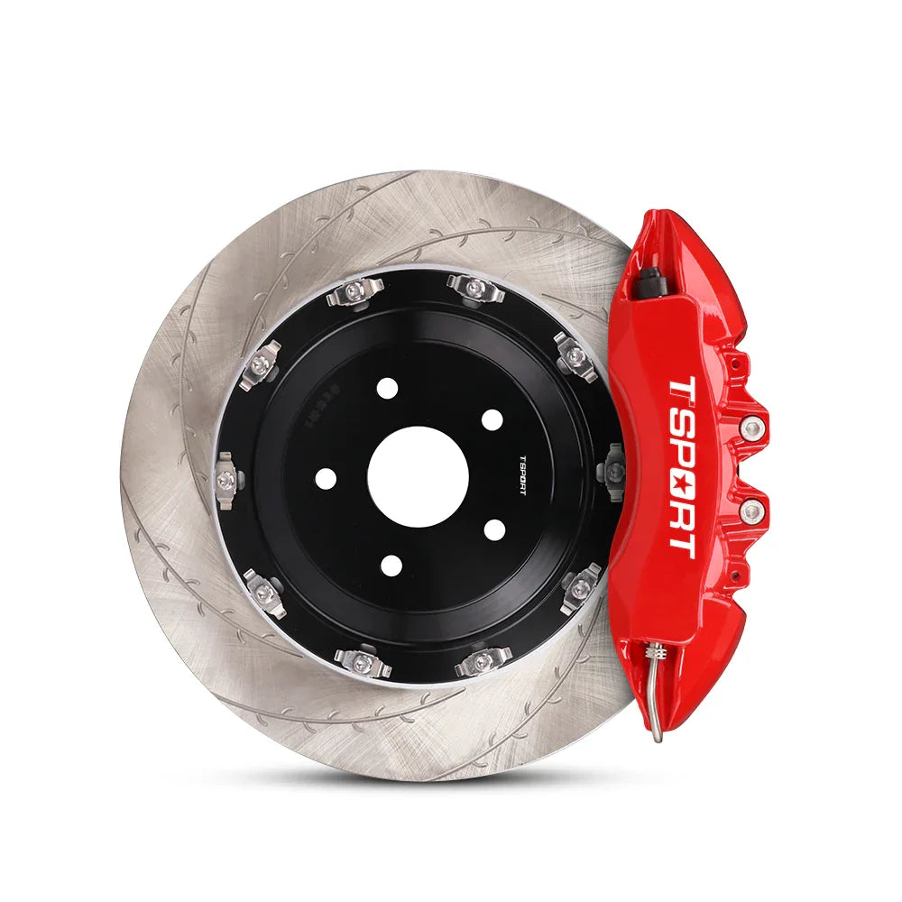 Close-up of a red TTSPORT 7640 6-piston forged brake caliper for the front wheel and a slotted 2-piece floating rotor.