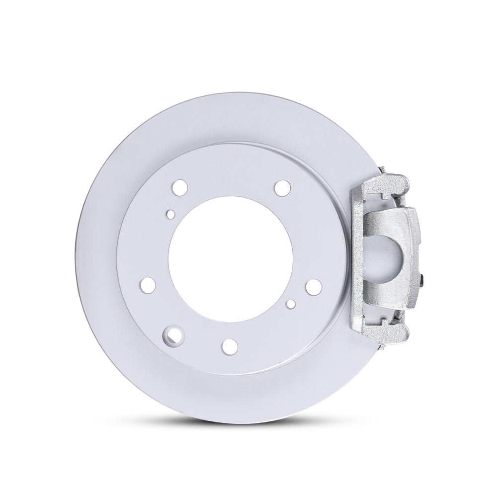 Close-up of a sliver TTSPORT Suzuki Jimny floating brake caliper for the rear wheel and a blank rotor.